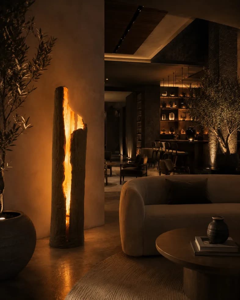 Renders of the Citrea lamp placed in warm living room interiors (2 of 2)